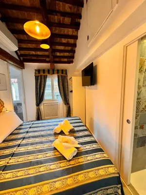 Letto o letti in una camera di Piccolo Paradiso