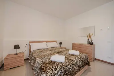 Letto o letti in una camera di Unico Apt 4, 6 ospiti, parcheggio gratis, 10 minuti da Venezia