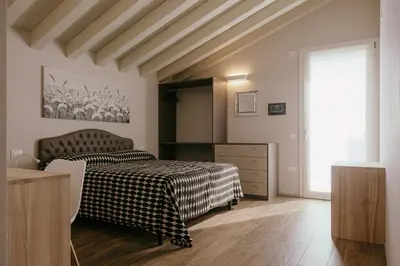 Letto o letti in una camera di Tenuta degli Ulivi