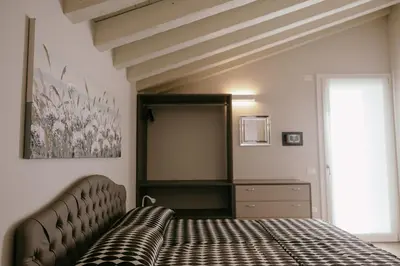 Letto o letti in una camera di Tenuta degli Ulivi