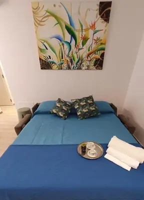 Letto o letti in una camera di Dp House