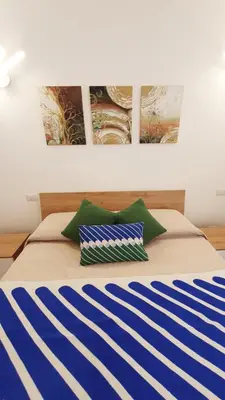 Letto o letti in una camera di Dp House