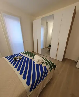 Letto o letti in una camera di Dp House