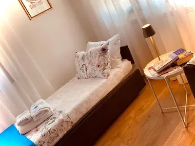 Letto o letti in una camera di Casa AnnaPaola Luxury