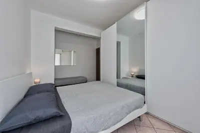 Letto o letti in una camera di Marila Deluxe 2, Giadino con Idromassaggio