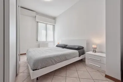 Letto o letti in una camera di Marila Deluxe 2, Giadino con Idromassaggio