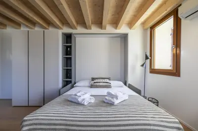 Letto o letti in una camera di Molino 2 by WelcHome