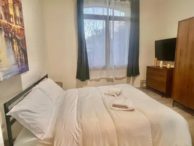 Letto o letti in una camera di Villa Margherita