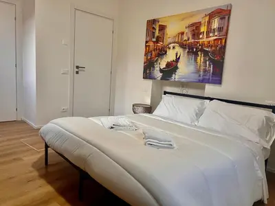 Letto o letti in una camera di Villa Margherita