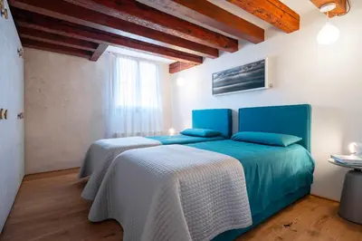 Letto o letti in una camera di Ca Grifalconi