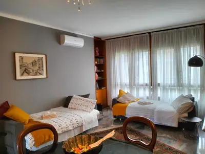 Letto o letti in una camera di Urbino Uno Apt Venezia