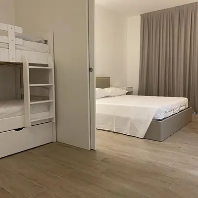 Letto o letti in una camera di [Luxury_Apartment_Baia_Blanca] Pool & Free Parking