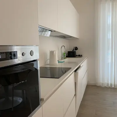 Cucina o angolo cottura di [Luxury_Apartment_Baia_Blanca] Pool & Free Parking