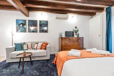 Letto o letti in una camera di Guggenheim Studio