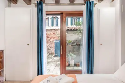Letto o letti in una camera di Guggenheim Studio