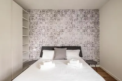 Letto o letti in una camera di GuestHost - Parco Santa Rita Flat - Padova