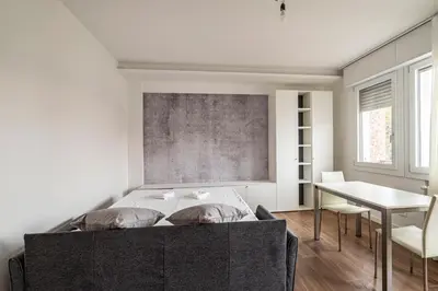 Letto o letti in una camera di GuestHost - Parco Santa Rita Flat - Padova