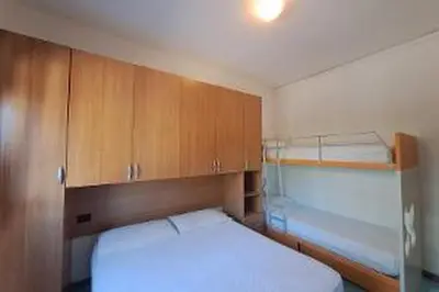 Letto o letti in una camera di Villa Monica - Seasons Real Estate - Lido di Jesolo