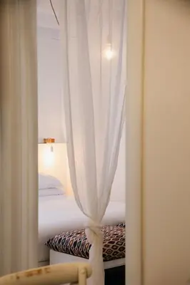 Letto o letti in una camera di Casa Airoldi Incantevole appartamento in laguna
