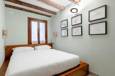 Letto o letti in una camera di La Caorlina - Pied à Terre - Bas-relief