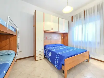 Letto o letti in una camera di Voltacinque Family Apartment