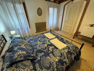 Letto o letti in una camera di Exclusive Venice Kingsclass