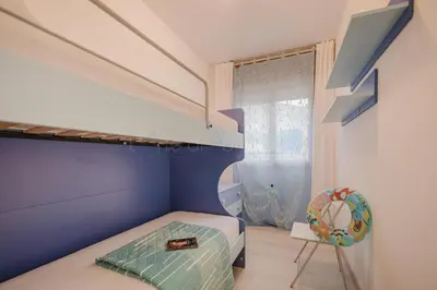 Letto o letti in una camera di Levantina Mare