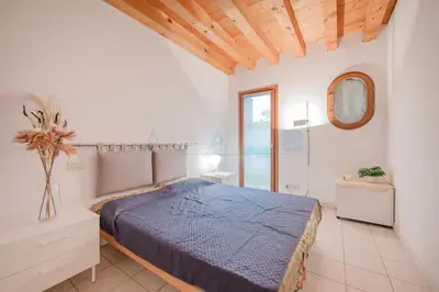 Letto o letti in una camera di Residence Ca Tron Mare