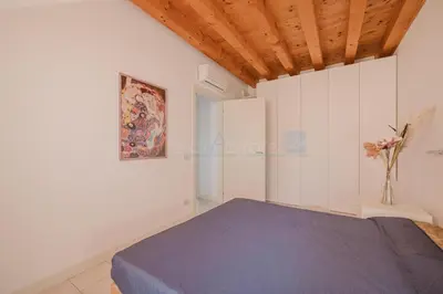 Letto o letti in una camera di Residence Ca Tron Mare