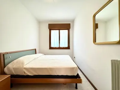 Letto o letti in una camera di Carnelos - Carraro Immobiliare - Family Apartments