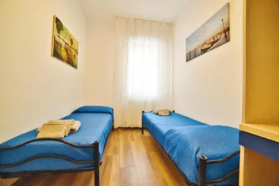 Letto o letti in una camera di Casa Dalmazia