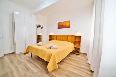 Letto o letti in una camera di Casa Dalmazia