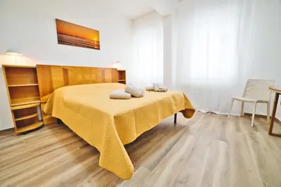 Letto o letti in una camera di Casa Dalmazia