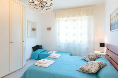 Letto o letti in una camera di Casa Serenissima - with free parking