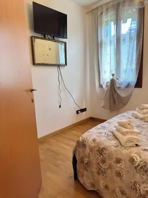 TV o dispositivi per l'intrattenimento presso Villa Gardenia - Comfort & Privacy - River View
