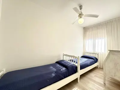 Letto o letti in una camera di Tritone 12 - Carraro Immobiliare - Family Apartments