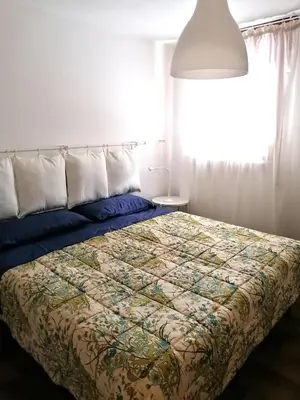 Letto o letti in una camera di Appartamento Zona ospedale