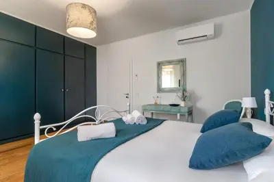 Letto o letti in una camera di Casa dei Fiori