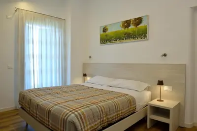 Letto o letti in una camera di ALMA Guest House