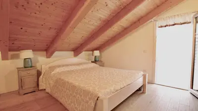 Letto o letti in una camera di Condominio Oderzo - Home Immobiliare