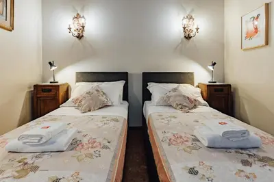 Letto o letti in una camera di Palazzino Veneziano - Charme in the Serenissima