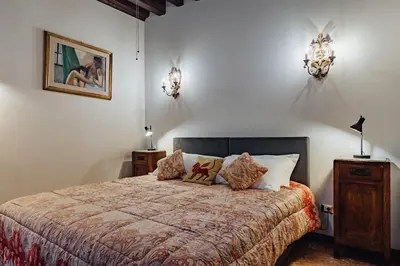 Letto o letti in una camera di Palazzino Veneziano - Charme in the Serenissima