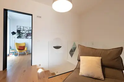 Area soggiorno di GuestHost- Exclusive Villa with Private Garden