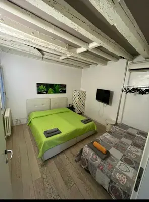 Letto o letti in una camera di Rialto Rooms very central