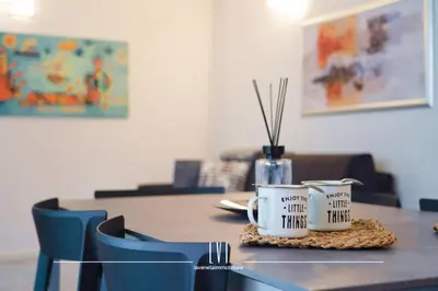 Area soggiorno di Jesolo Wave - Private Garden & Pool Retreat