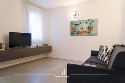 TV o dispositivi per l'intrattenimento presso Jesolo Wave - Private Garden & Pool Retreat
