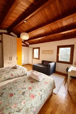 Letto o letti in una camera di B&B Villa Euganea