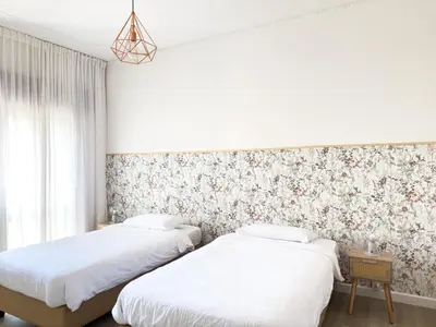Letto o letti in una camera di San Giuliano Apartment