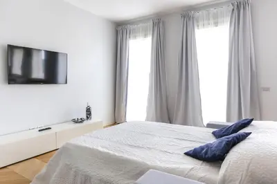 Letto o letti in una camera di Riverside Apartment