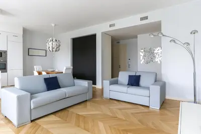 Area soggiorno di Riverside Apartment
